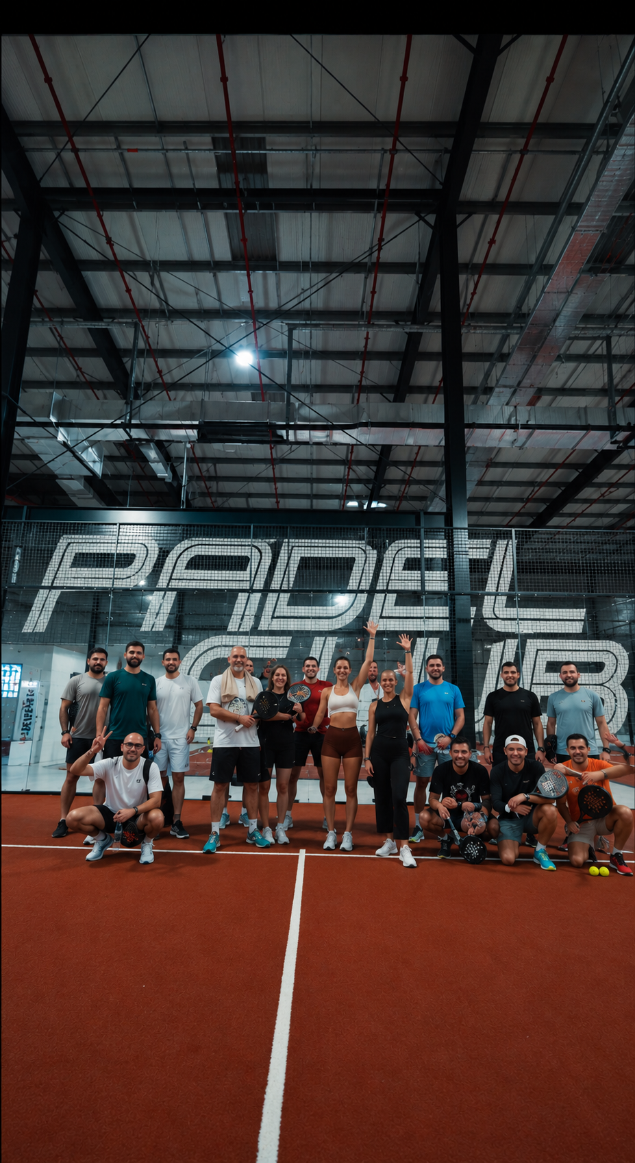 Our padel community together on a terracotta indoor court